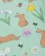 The delicate rabbit, flowers, bee and lady bird print detail on the Frugi Little Libby Printed Leggings - Riverine Rabbits, made from GOTS Organic Cotton.