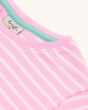 A closer view of the Frugi Children's Organic Cotton Camille Applique T-Shirt - Bee Great collar and Frugi logo label. A light pink and white stripe short sleeve t-shirt on a cream background