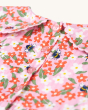 A closer view of the button fastenings on the back of the Frugi GOTS organic cotton Matilda Collared Dress - Pink Floral Fun