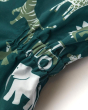 Close up of the animal print and stitching on the Frugi farm life all in one outfit