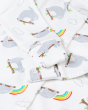 A closer view of the sleeves and cuffs on the Frugi Baby Organic Cotton Lovely Babygrow - Sleepy Sloths. A footed babygrow imade from super soft organic cotton and features adorable sleepy sloths and rainbows all-over print, on a cream background