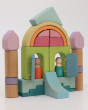 A beautiful house play scene created by using the Grimm's Cloud Play set. Colourful and natural blocks create the flat wooden house. Two Grimm's friends are relaxing at the house, both are at the front doors overlooking the blue wooden steps.