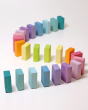 Grimms Wooden Pastel Duo Blocks lined up in an S shape line like dominoes