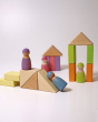 Grimms Friends are using the Grimms Wooden Pastel Duo Blocks as a slide and as houses