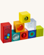 The HABA Discovery Blocks - Colours Galore nearly stacked on top of each other, showing the versatility of the blocks set
