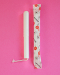 The Hey Girls Cardboard Applicator Tampons - Regular Absorbency tampon out of it's packet, on a pink background