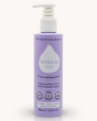 Kokoso organic coconut oil baby lotion bottle on a cream background