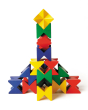 Naef Spiel wooden construction blocks stacked in a geometric tower on a white background