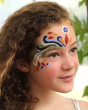 Young girl with a colourful Natural Earth face paint pattern around her eye