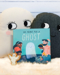 No Home for a Ghost kids book from Owlet Press on a fluffy blanket next to some Roommate Ghost cushions