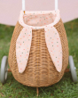 A closer view of the Olli Ella Rattan Bunny Luggy with Lining – Gumdrop fabric bunny ears on the front of the basket