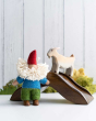 Papoose Toys Bearded Felt Tomten Gnome with a wooden bridge and goat toy in the background