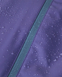 Water droplets on a Patagonia Kid's Torrentshell 3 Layer Waterproof Rain Jacket in purple, showing how the rain doesn't absorb into the material or zip