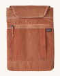 The removable pouch from inside the Patagonia Atom Tote Backpack 20L - Skiff Blue, on a cream background