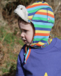 Close up of a young child wearing the Piccalily organic cotton rainbow stripe flapper hat
