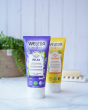 Weleda Harmony Relax Shower Gel 200ml, a blue tube of natural shower gel with a yellow tube behind