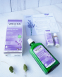 Weleda Relax & Unwind Wellbeing Gift Set - Lavender.  This luxurious lavender gift set includes Lavender Relaxing Bath Milk 200ml and a mini Lavender Relaxing Body Oil 10ml. Also pictured is the bath milk and oil packaging packaging and a self care sheet.