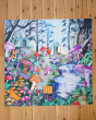 Wonderie sensory play cloth, Enchanted Toadstool Forest. A beautiful, and enchanting forest scene filled with colourful toadstools in pink, orange, purple and red, nestled between a flowing, stepped waterscape and an orange footpath, on a wooden floor bac