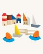 The PlanToys Marina Blocks. A set of 27 wooden blocks including decks, sail boats, port city and lighthouse for creative, open-ended play
