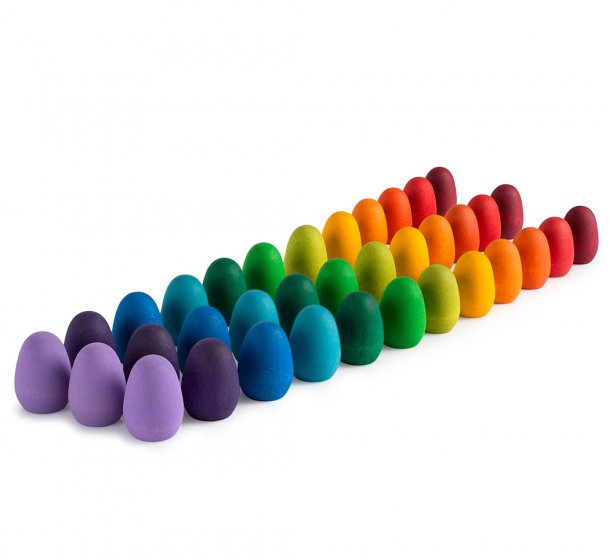 32 multicoloured Grapat Mandala Rainbow Eggs lined up in rows on a white background.