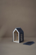 Babai eco-friendly magnetic dollhouse toy on a grey background