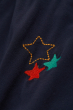 Close up of the embroidered stars on the Frugi organic cotton indigo harem trousers