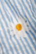 Close up of an embroidered daisy detail on the Frugi Beach Hut Blue and white Stripe Cassie Collared Dress