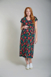 Frugi Ceclila bright bold floral wrap maternity dress worn by woman