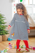 a child wearing frugi dea dress 