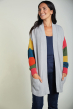 Woman modelling carrie grey marl rainbow stripe sleeve maternity cardigan by frugi
