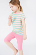 Child wearing the pink shorts from the Frugi Hedgerow print and Mid Pink Laurie Shorts 2 Pack