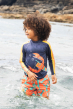 Child wearing the Frugi Indigo Lobster design Sun Safe Rash Vest 