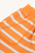 A closer look at the soft short material, the pocket and stitching on the Frugi Organic Little Ellis Shorts - Tangerine Breton Stripe, on a cream background