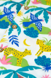 A close up of the colourful Jaguar Jungle print, with tropical jungle plants, flowers and trees, birds and jaguars, along with the wooden buttons of the Frugi Organic Harvey Hawaiian Shirt - Jaguar Jungle
