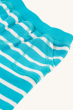 A closer view of the stitching on the Frugi Children's Organic Cotton Little Ellis Shorts - Tropical Sea Breton Stripe. Super soft organic cotton, light aqua blue and white Breton striped shorts have a comfy elasticated waistband and two handy pockets