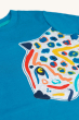 A closer look at the Jaguar applique on the Frugi Organic Carsen Applique T-Shirt - Deep Water / Jaguar. A grey Jaguar with colourful blue, red, orange, yellow and green spots, and a navy and yellow eye. On a cream background