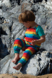 Child modelling Frugi Parsnip rainbow organic cotton dungaree