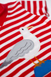 Close up of the seagull applique on teh front of the T-shirt from teh Frugi Easy On Outfit - True Red Stripe/Seagull/Indigo
