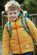 Child wearing Frugi Above & Below Reversible Toasty Trail Jacket
