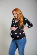 Frugi Black and white polka dot winnie organic cotton top being modelled by a pregnant woman