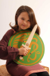 Child holding a Vah Wiki Wooden Dagger and a green celtic sigar round shield