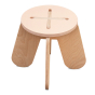 Babai eco-friendly pink wooden X stool on a white background