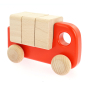 Bajo children's plastic-free wooden truck with blocks toy in the coral colour on a white background