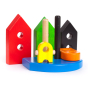 Bajo plastic-free stacking shape toy set up in a town scene on a white background