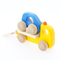 Bajo sustainable wooden tow truck toy with small car toy on a white background