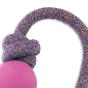 Close up of Beco Pets pink natural rubber ball on rope dog toy on a white background.
