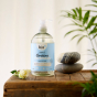 Bottle of Bio-d fragrance free sanitising hand wash with stones and white rose