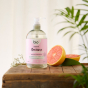 Bio-D bottle of geranium and grapefruit sanitising hand wash with pump with grapefruits