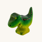 Wooden toy baby T-Rex in vibrant shades of green and purple. The baby T-Rex stands upright in a forward stance. The toy has painted eyes, claws, and body detail.