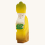 Bumbu Wooden Nativity Figure - Three Kings Balthazar on a cream background. Balthazar wears a green and yellow outfit and crown, has a white beard and is holding a green gift with gold details.